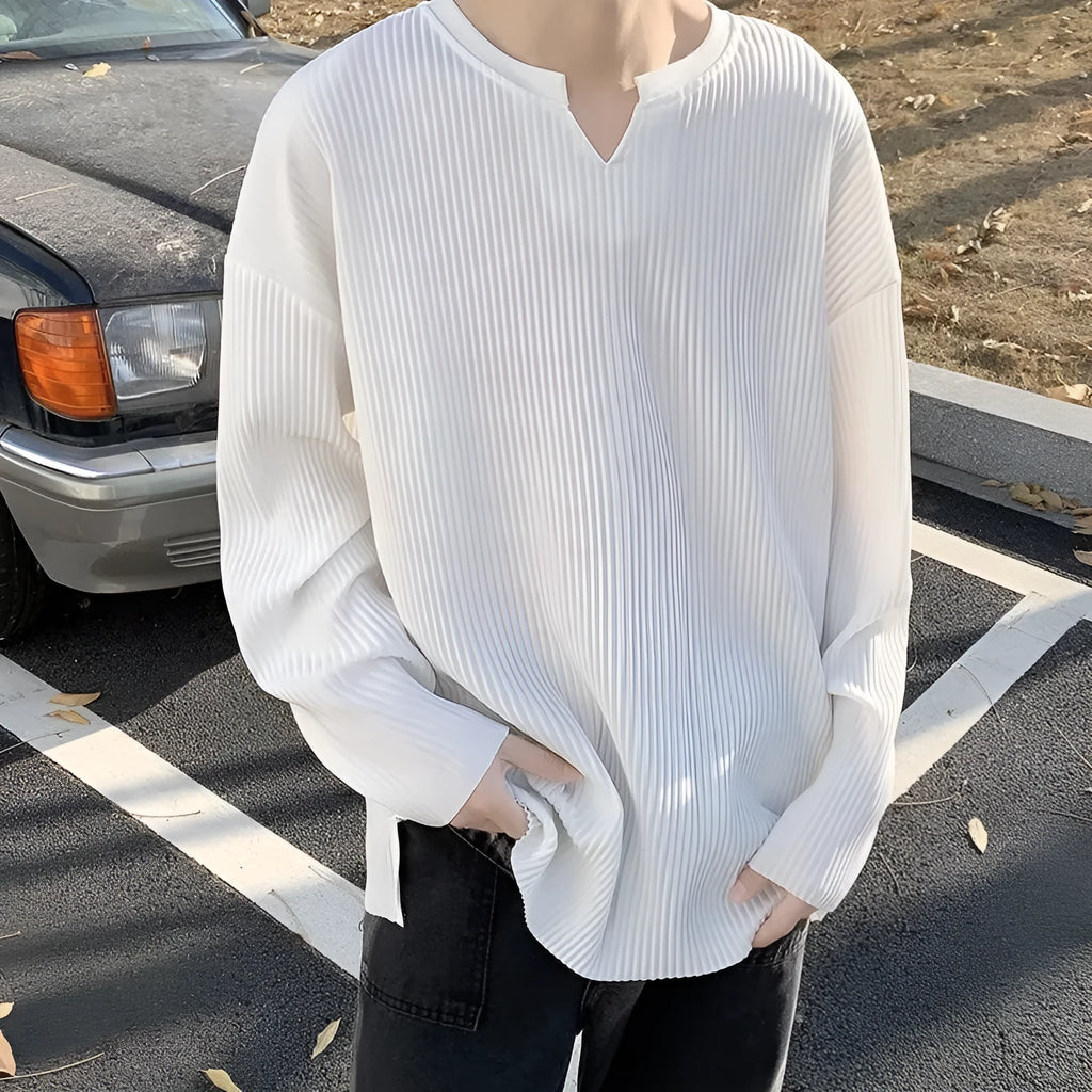 Plus size women's striped texture pullover top in loose fit with long sleeves