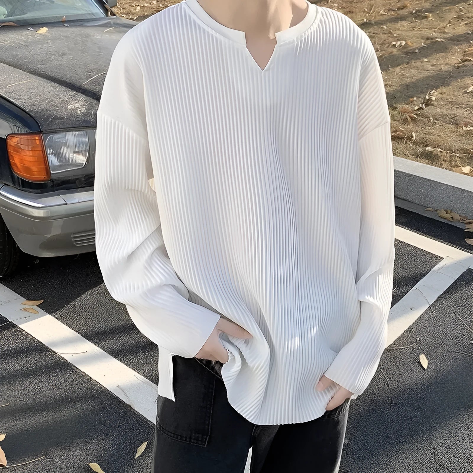 Plus size women's striped texture pullover top in loose fit with long sleeves