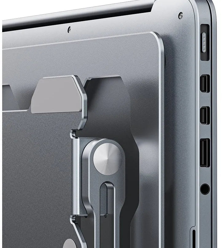 Grey aluminum laptop stand in folded position showing adjustable mechanism and silicone protection points