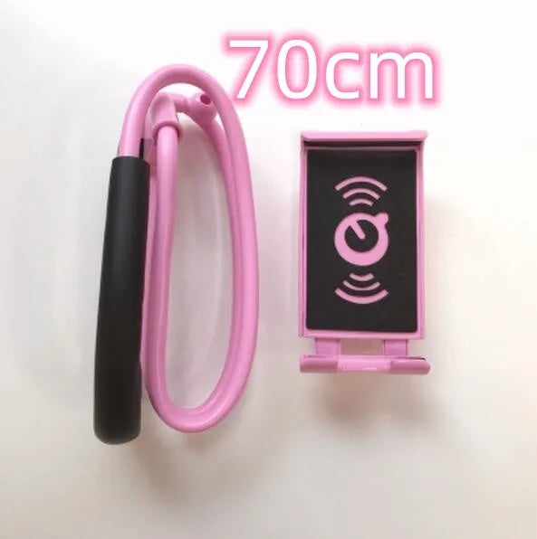 Universal 360-degree rotating phone holder in multiple colours on a table, holding a smartphone.