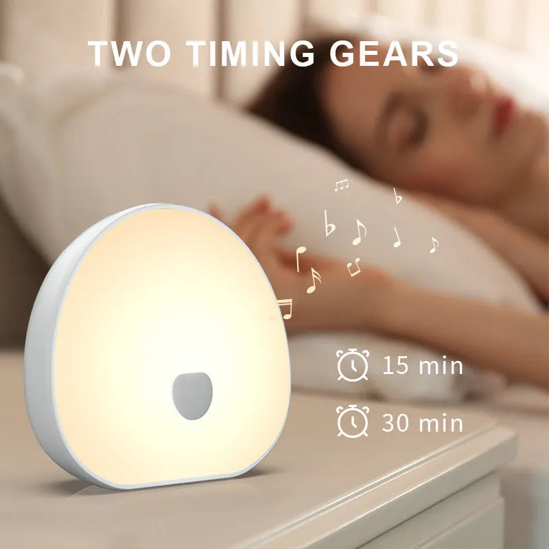 White rechargeable baby night feeding comforter with soft fabric and musical functions