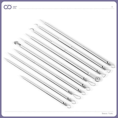 Four silver metal acne needles with ultra-fine pointed tips for blackhead extraction.