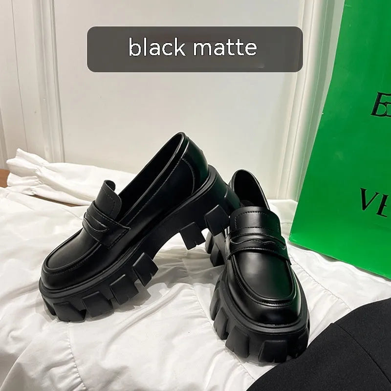 British style wide fit patent leather loafers with a rubber sole and muffin heel, shown in a choice of finishes.