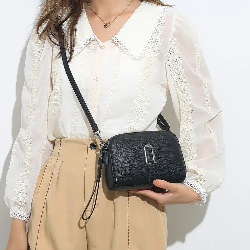 Women's genuine leather shoulder bag in horizontal square shape showing five colour options