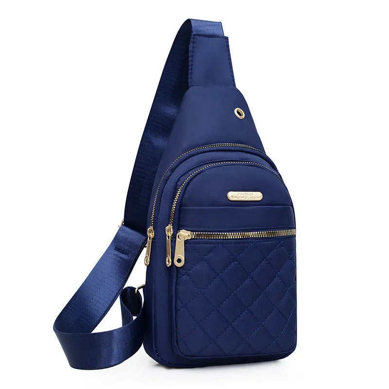 Girl's crossbody chest bag in Oxford cloth with plaid pattern available in multiple colours