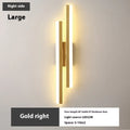 Scandinavian minimalist LED wall light with an acrylic shade on a black arm, mounted on a light-coloured wall.