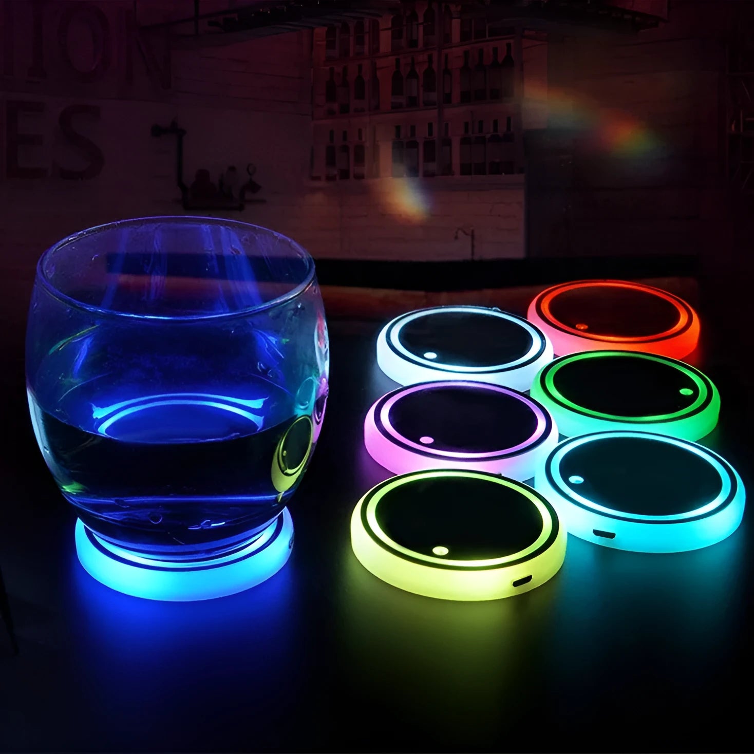 LED light-up cup coaster for cars showing seven colour modes and USB charging cable