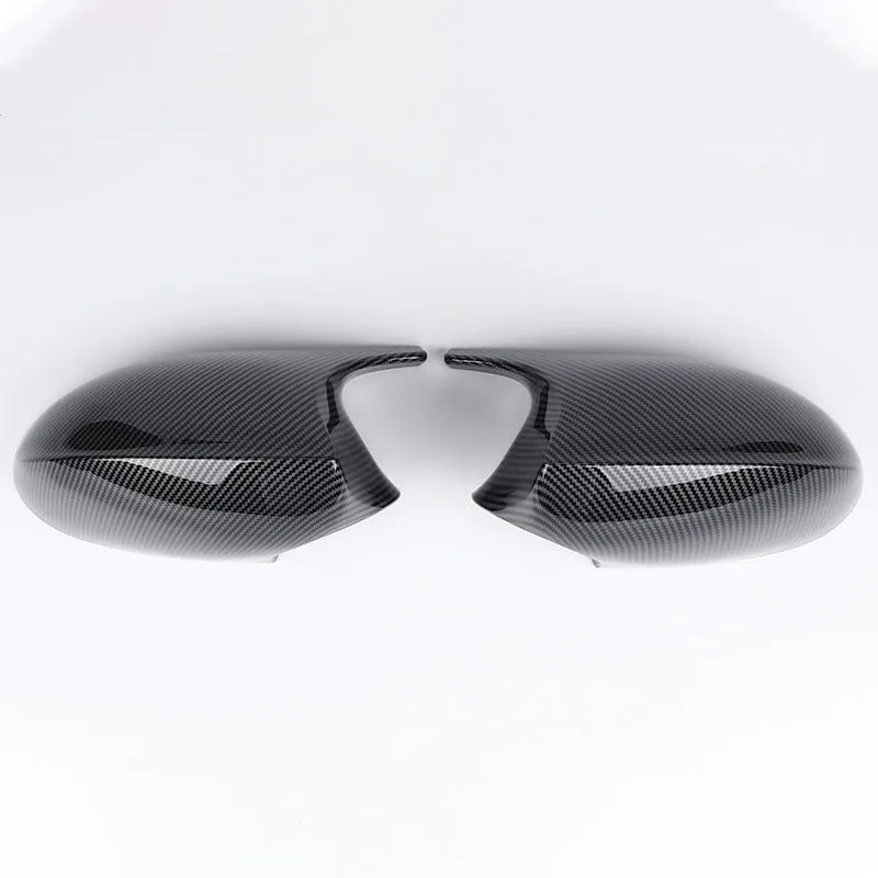 Pair of black ABS plastic rearview mirror housing shells for BMW 3 Series E90.