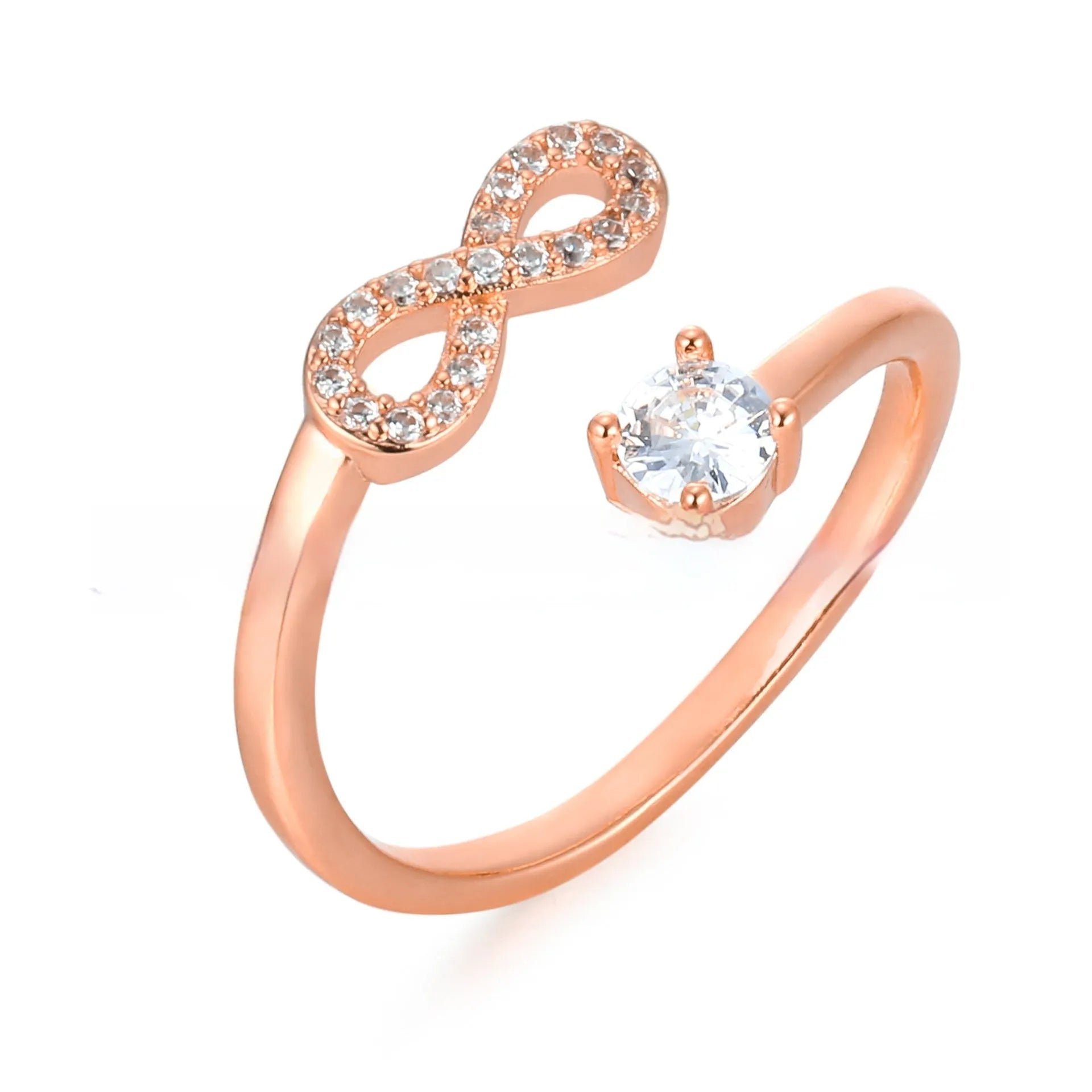 Geometric open band ring with a letter charm and inlaid zircon detail in gold colour.