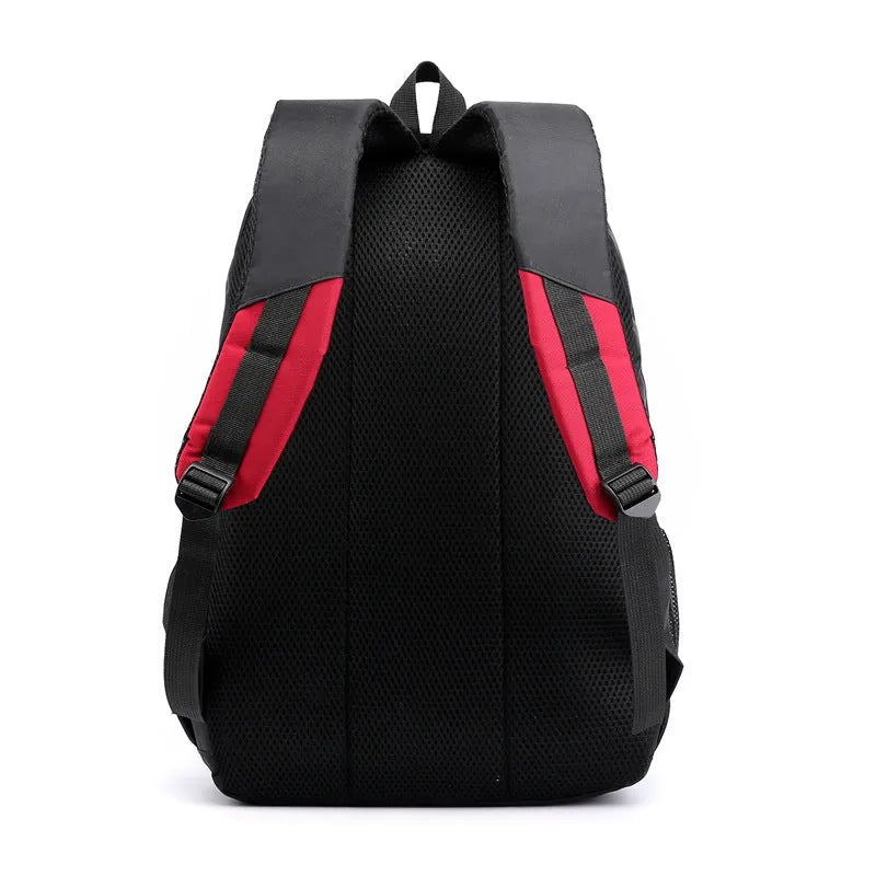 Black waterproof nylon school backpack with airpillow straps and contrast stitching detail.