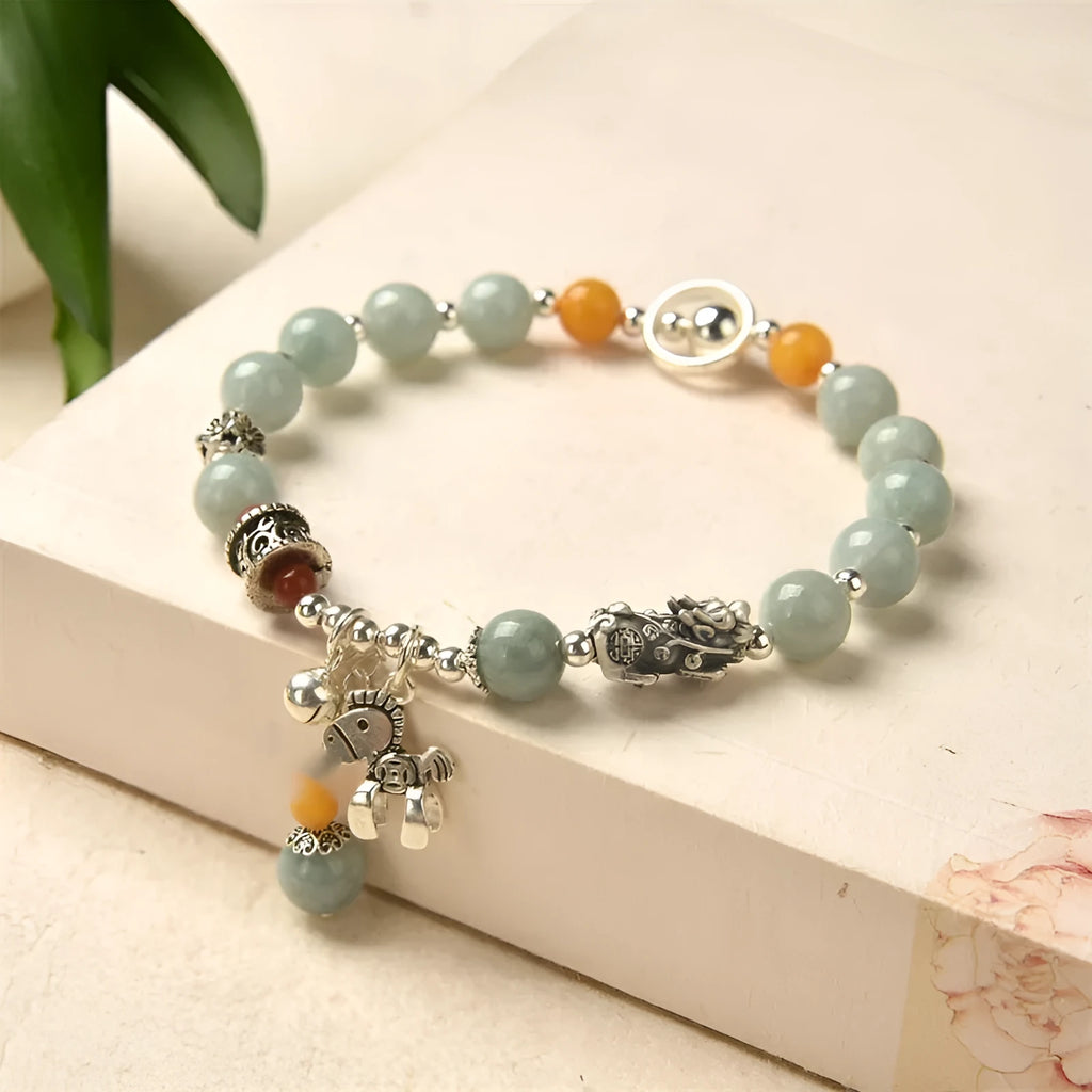 Natural emerald jade vintage bracelet with alloy fittings and retro styling