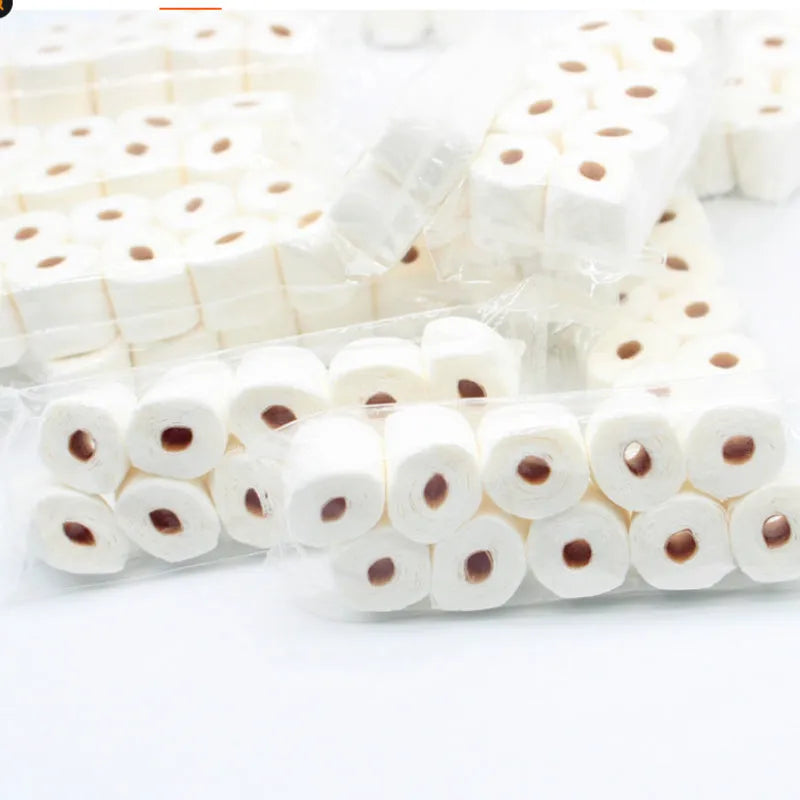 Miniature simulated toilet paper roll model made from paper, shown at 30mm by 15mm by 80mm scale.
