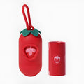 Portable dog poop bag dispenser capsule with a roll of scented inner bags in strawberry, orange, or cherry blossom design.