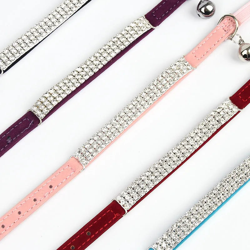 Velvet cat collar with rhinestone decoration shown in red colour with adjustable buckle