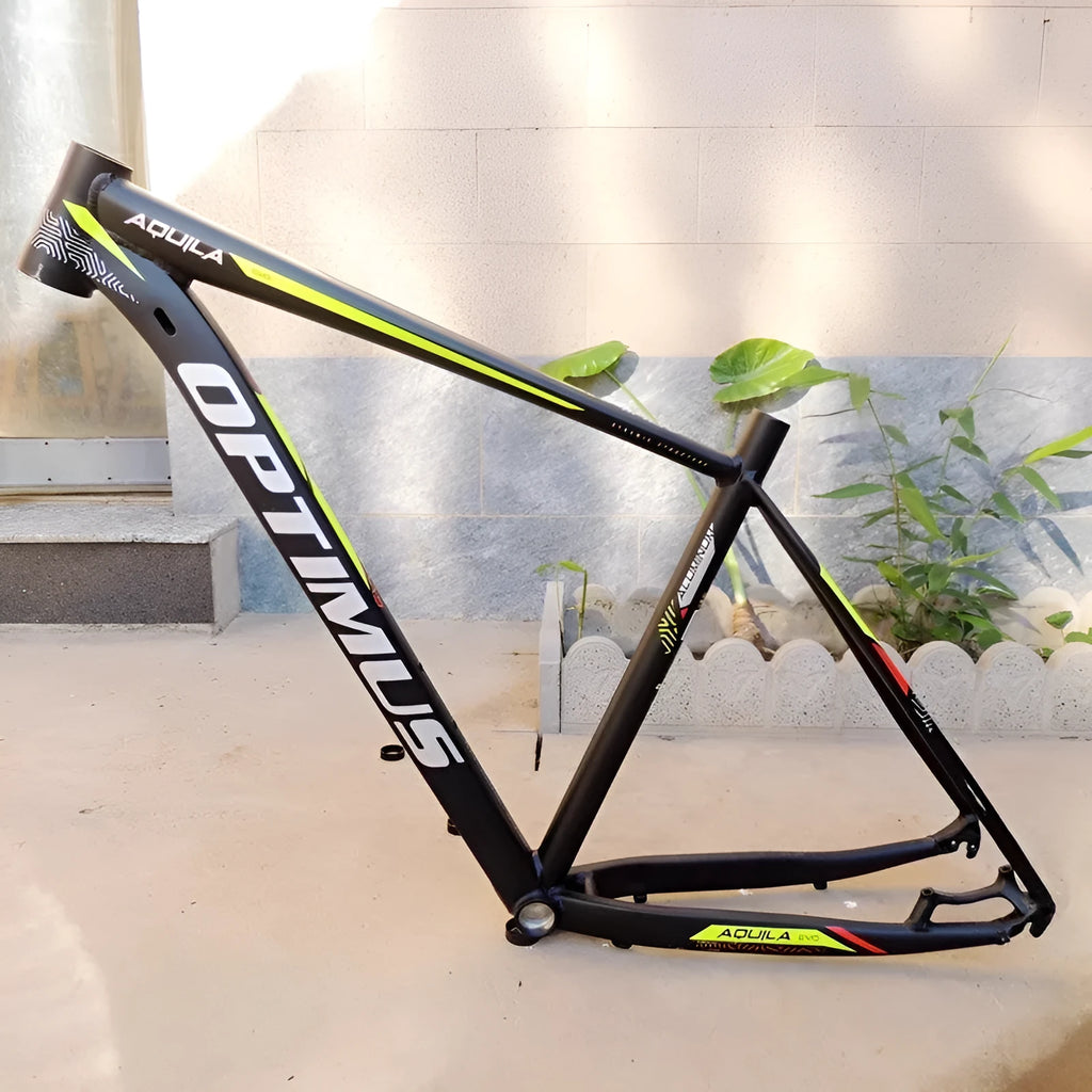 Black green aluminium 29-inch mountain bike frame with disc brake mounts and internal cable routing ports.