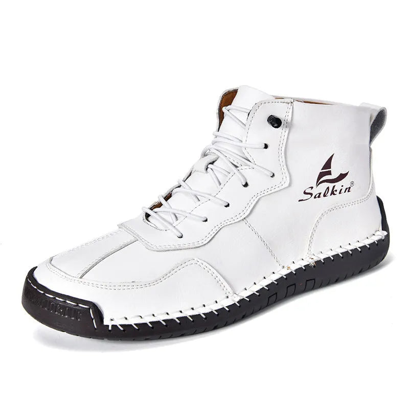 Men's dark blue retro high-top casual boots with lace-up front and elastic band on a white background.