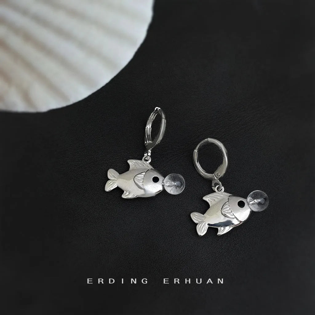 Pair of copper Bubble Fish earrings with goldfish animal modelling and electroplated finish.