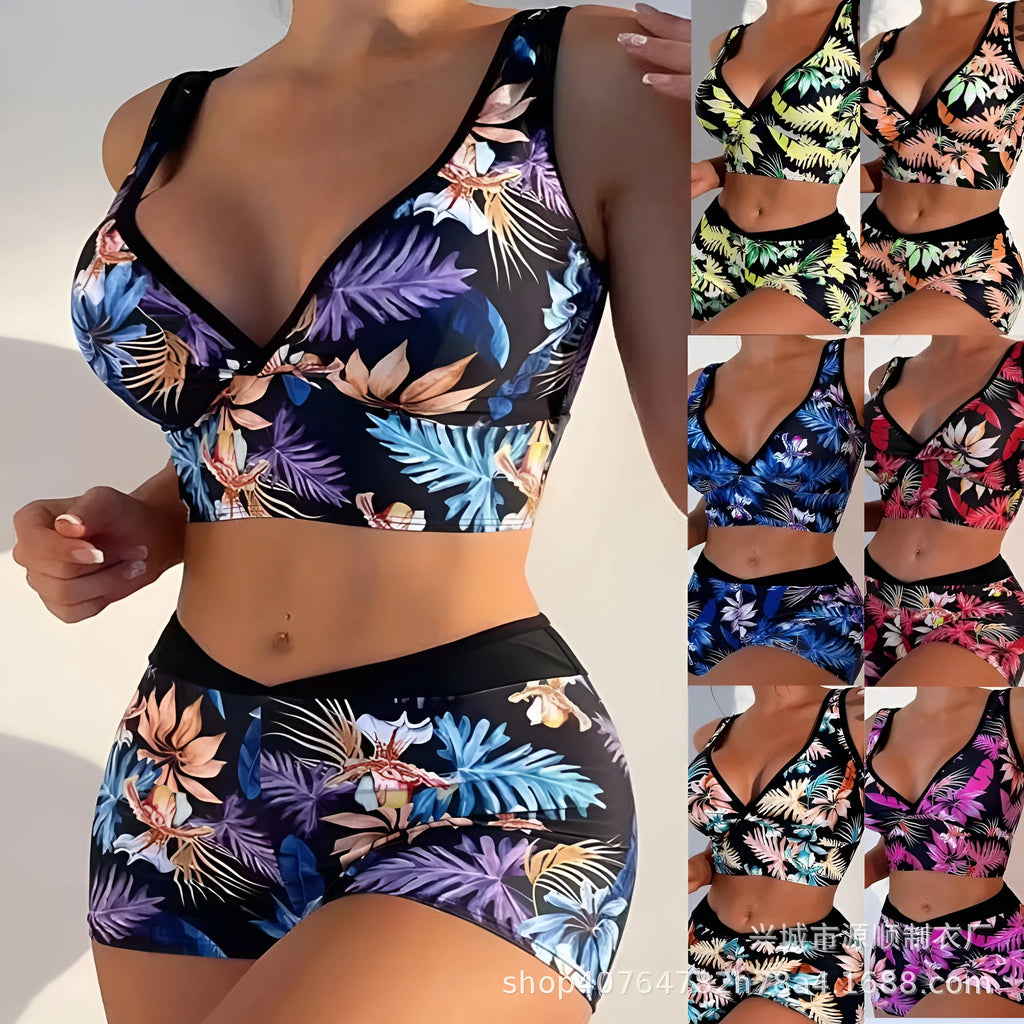 Women's two-piece printed swimsuit set with a sleeveless top and boxer-style briefs in a multicolour pattern.