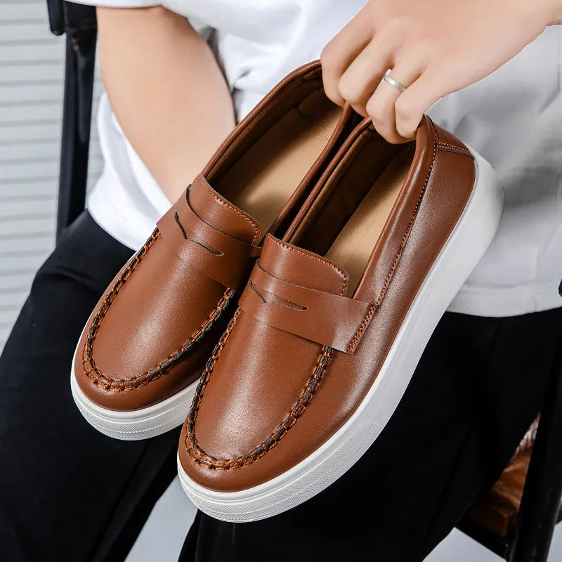 PU artificial leather slip-on casual shoes in white, shown in a side view on a neutral background.