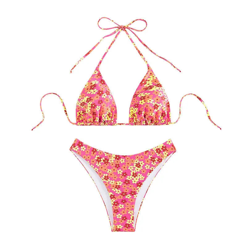 Women's blue floral swimsuit set with lace-up front and high-leg shorts