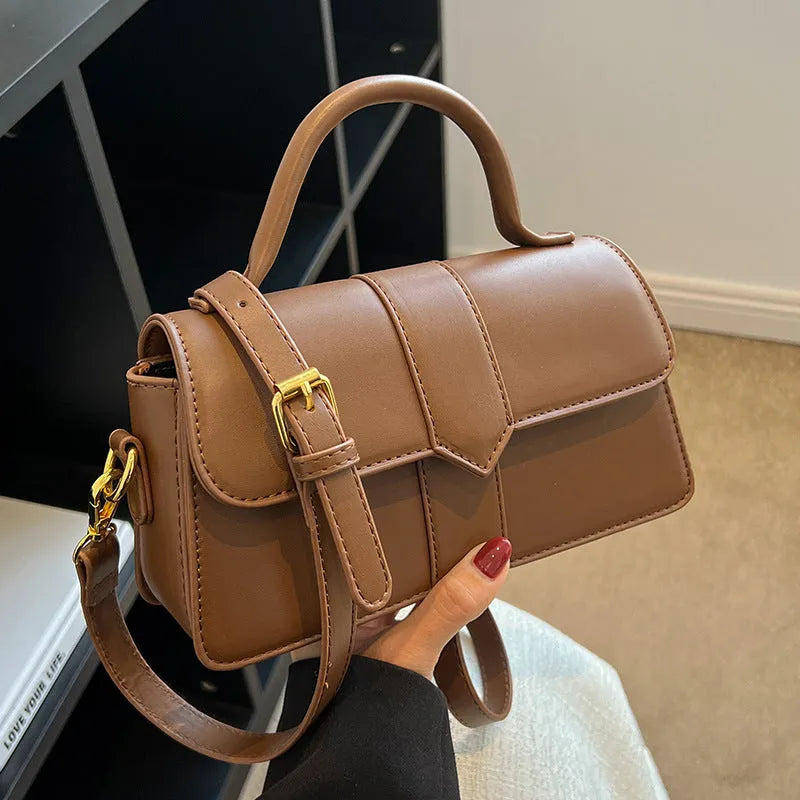 Women's PU messenger bag in horizontal square shape with file organisation internal structure