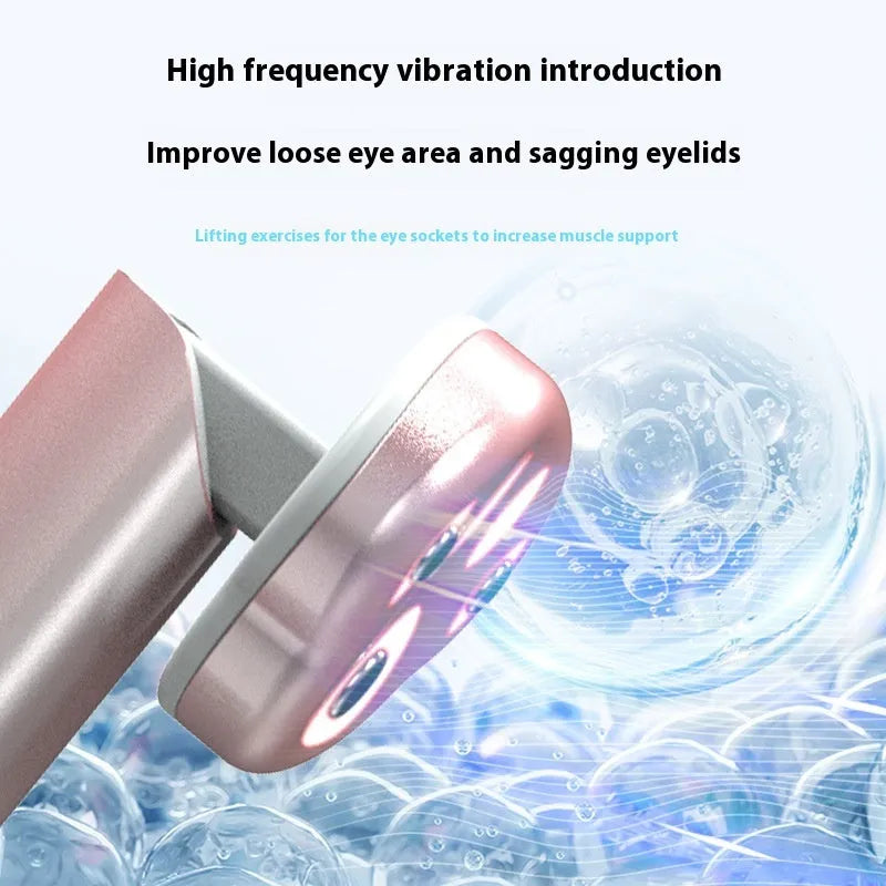 Gradient pink cat's paw shaped eye beautification instrument with micro-current therapy functions