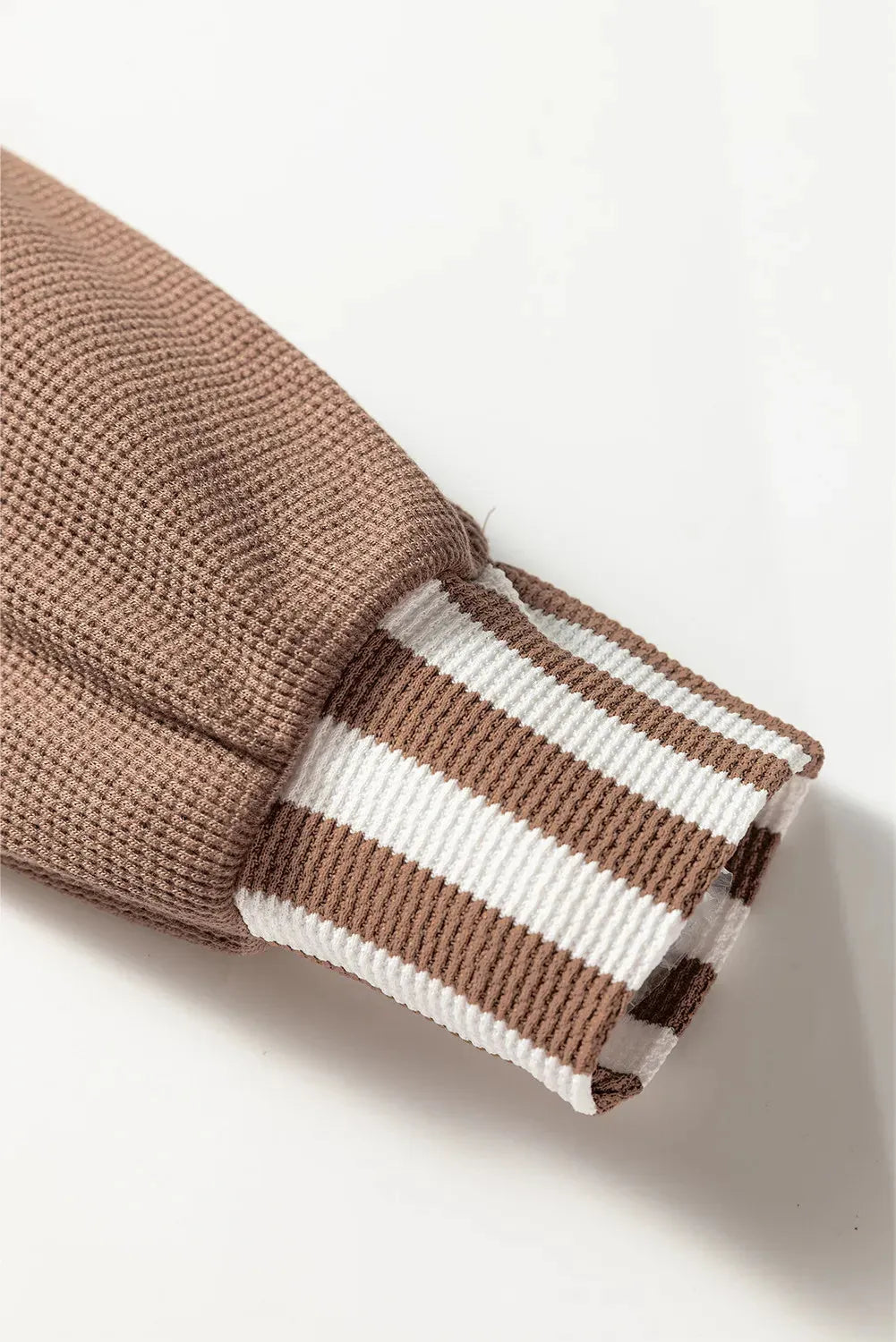 Straw yellow hoodie with waffle texture fabric and striped patchwork panels, button neck and drawstring waist
