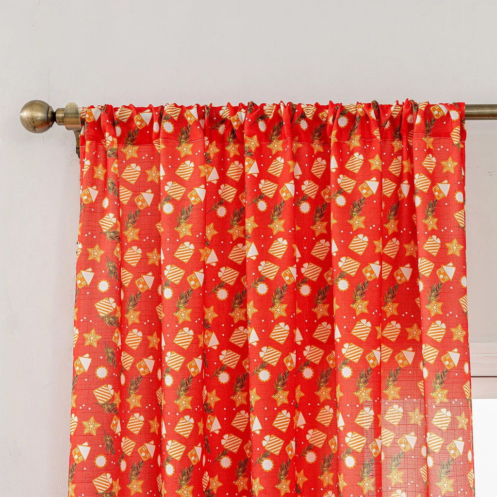 Green Christmas curtain with printed cartoon snowman and angel figures