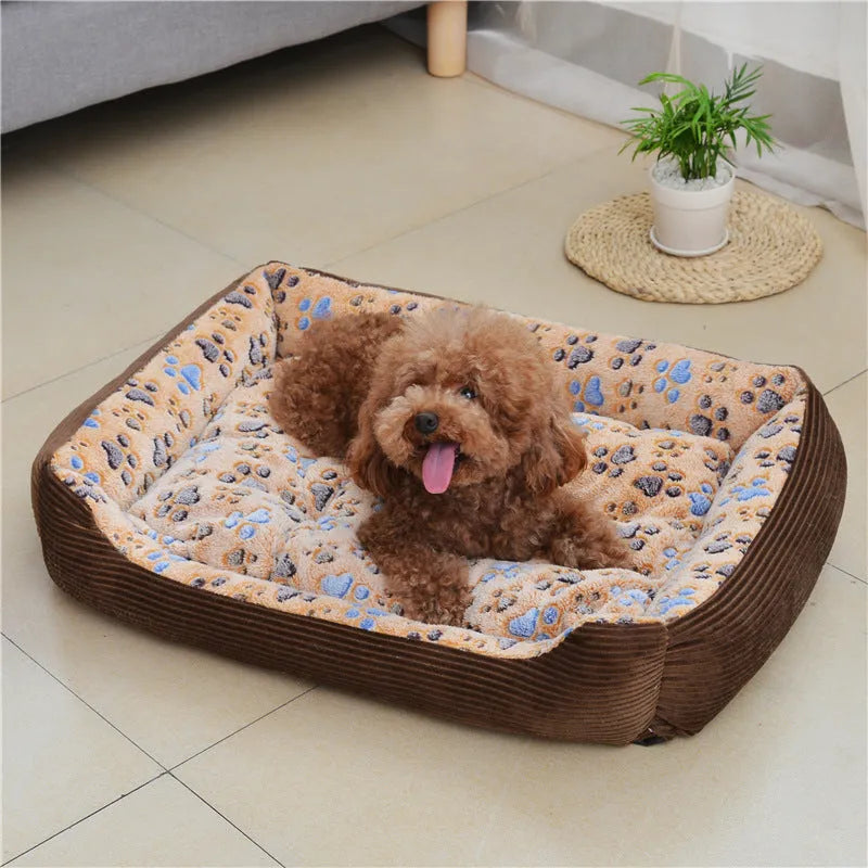 Beige soft plush dog bed with raised edges shown in a home setting.