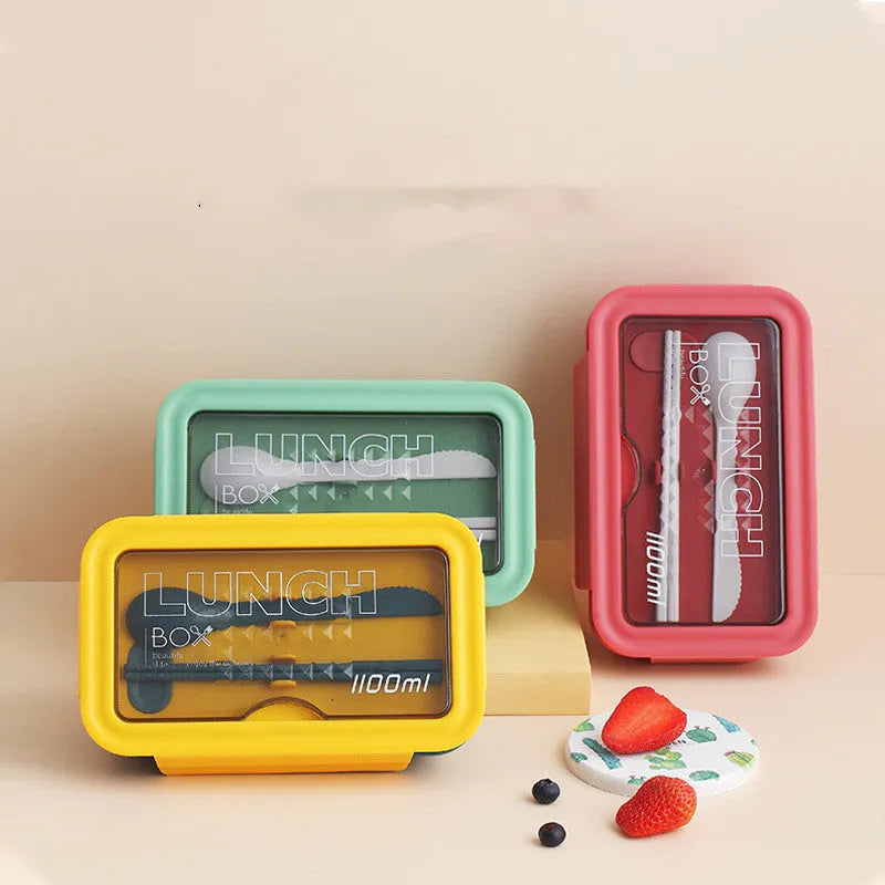 Green partitioned bento box with four compartments showing 20.5 cm plastic lunch container