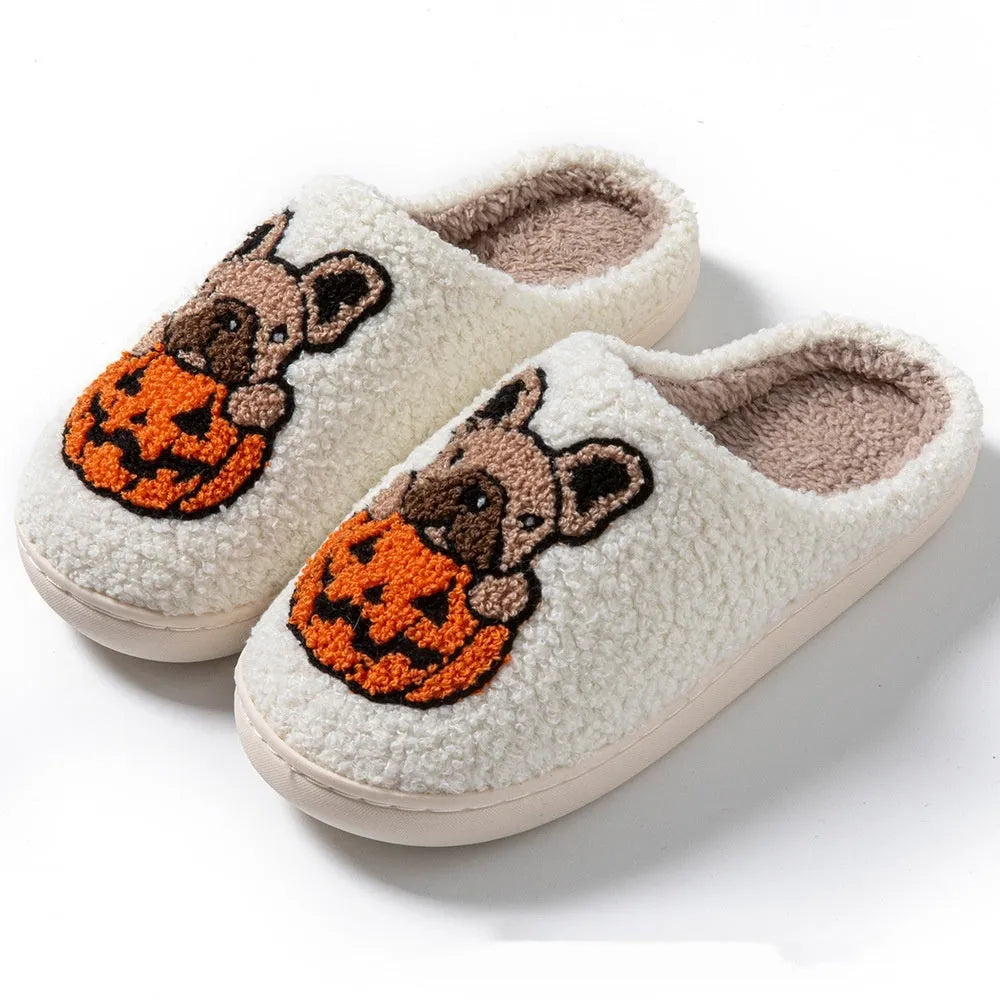 Black and white Halloween pumpkin patterned plush slippers with round toe and TPR rubber soles