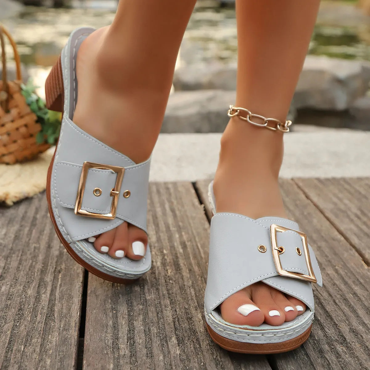 Women's black summer slippers with chunky heel and silver metal buckle on round toe design
