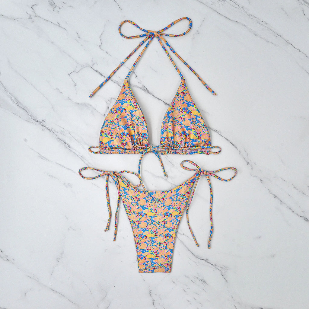 Lace-up bikini swimsuit in picture colour with backless briefs design for swimming.