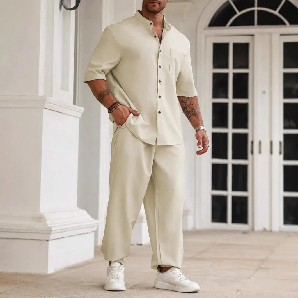 Men's casual apricot-coloured cotton linen short-sleeved shirt and trousers set laid flat.