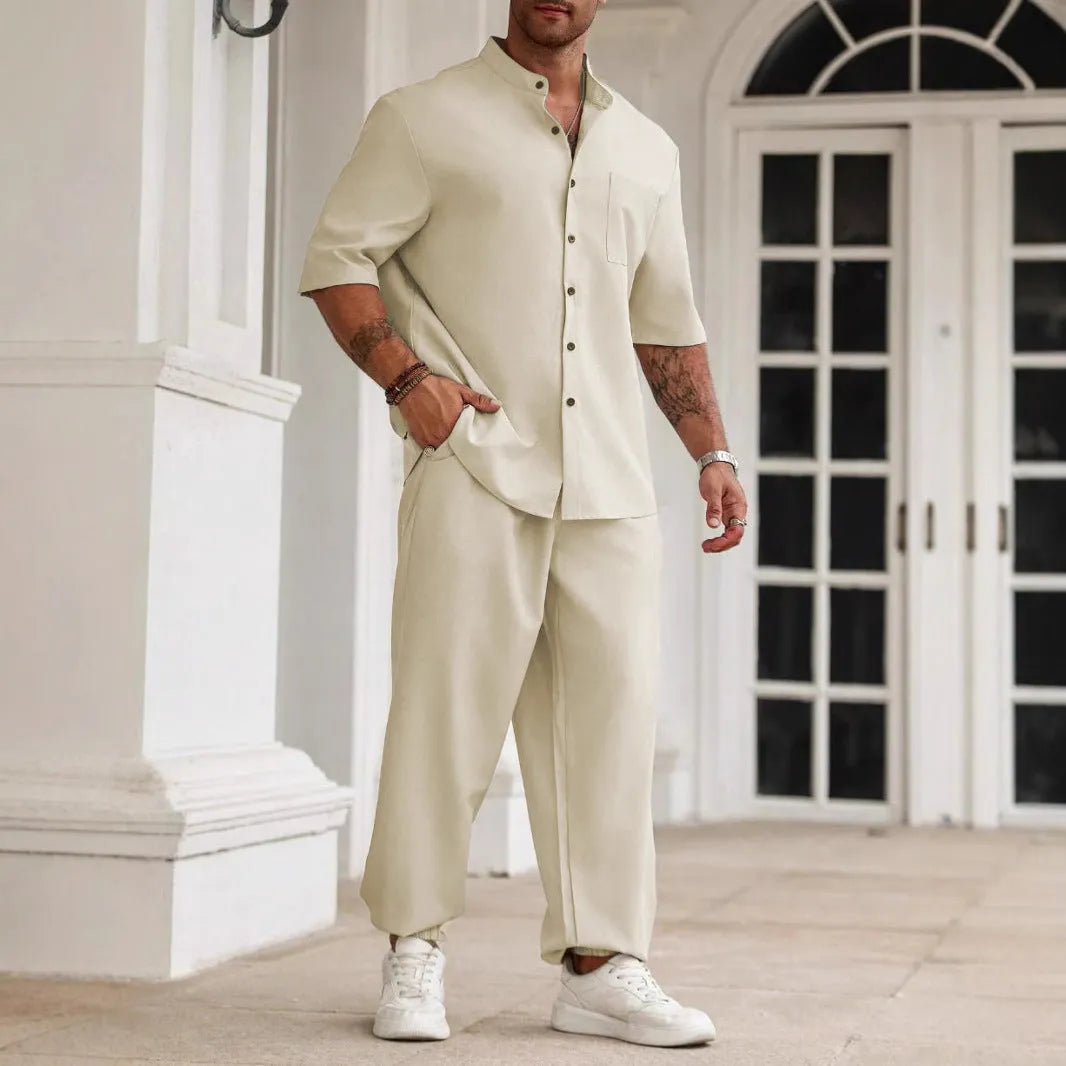 Men's casual apricot-coloured cotton linen short-sleeved shirt and trousers set laid flat.