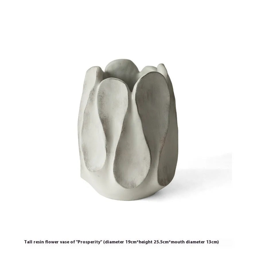 Irregular ceramic vase for flower arrangements in magnesium clay with natural textured finish