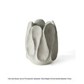 Irregular ceramic vase for flower arrangements in magnesium clay with natural textured finish