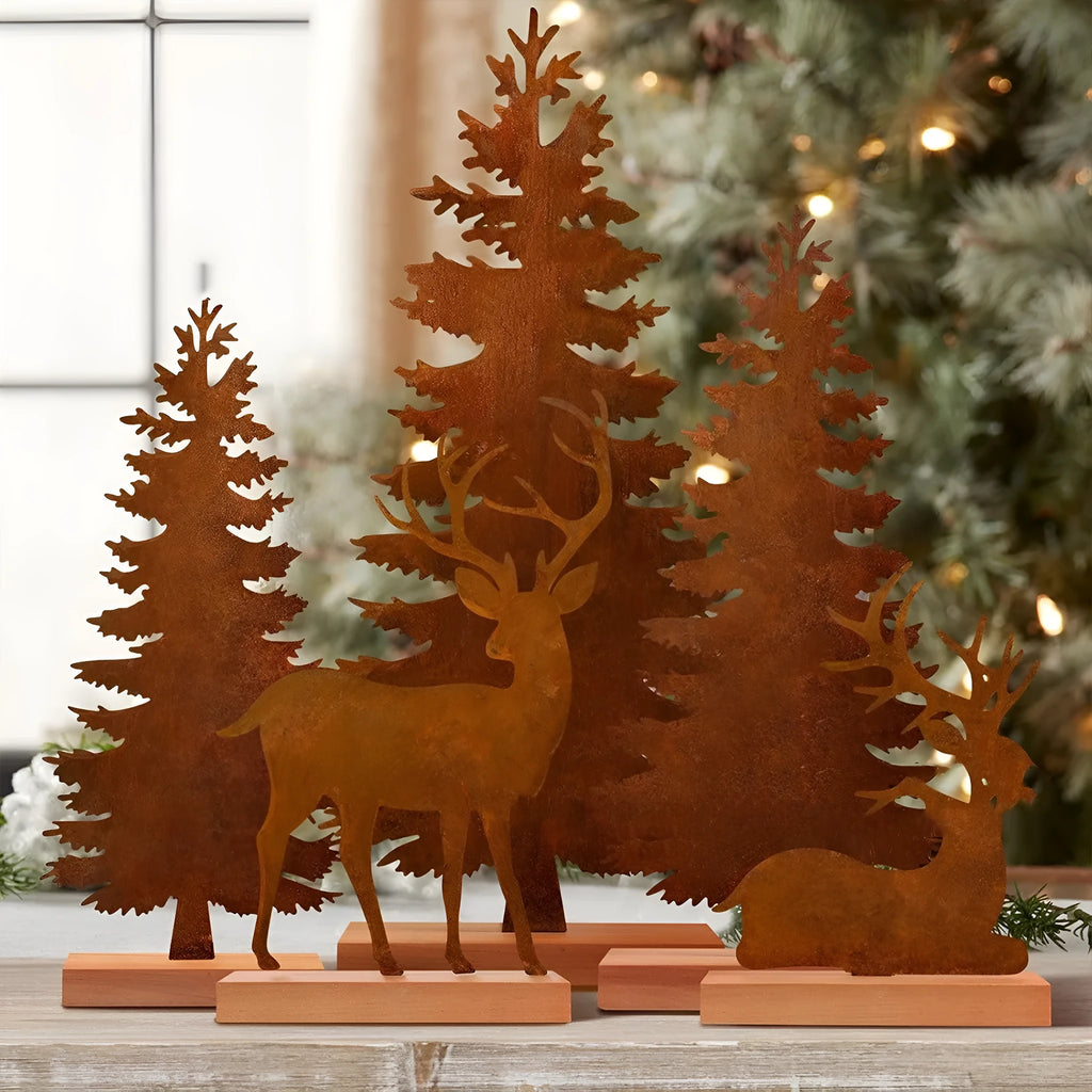 Three metal Christmas tree ornaments with elk silhouettes in rusty iron finish