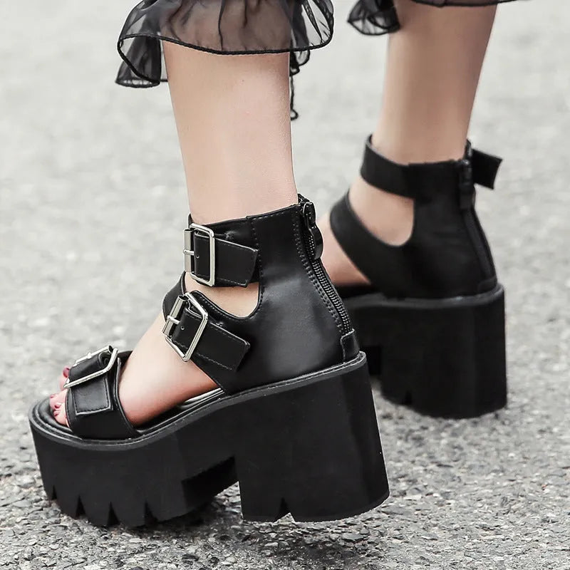 Black women's platform sandals with thick sole, chunky heel, buckle straps and round toe in Harajuku punk style