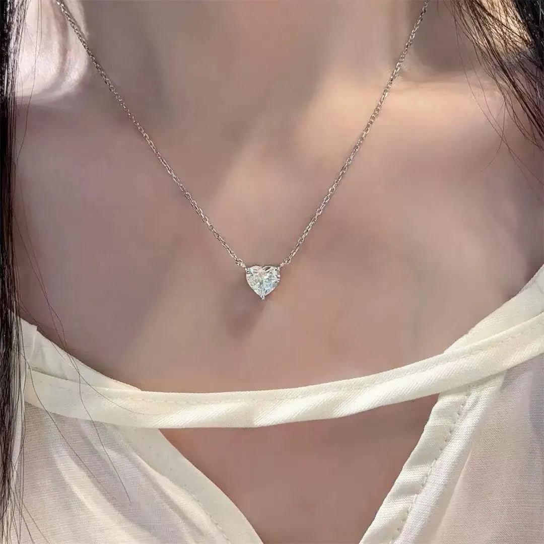 Women's silver heart necklace with minimalist copper pendant on chain