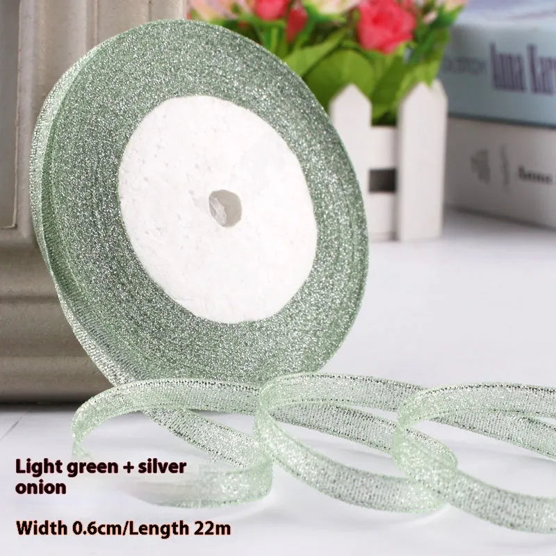 Roll of polyester gift packaging ribbon with 0.6cm width and 22 metre length in various colour options