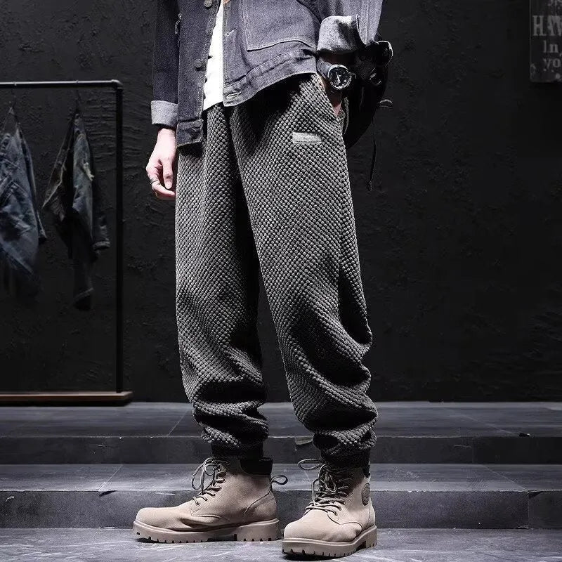 Men's grey straight leg sweatpants with ankle tie fastening on waistband