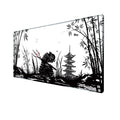 Japanese Samurai design gaming mouse pad on a desk, showing non-slip rubber base and cloth surface.