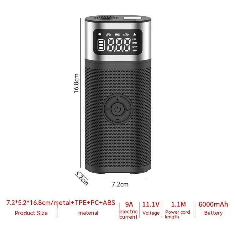 Black portable wireless air pump with digital display, LED light, and attached inflation tube on a textured surface.
