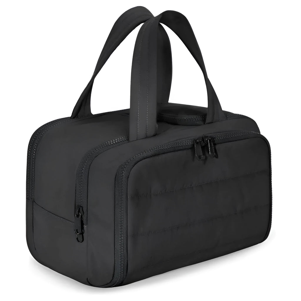 Large open travel toiletry bag in beige colour showing spacious interior, made from polyester fabric.