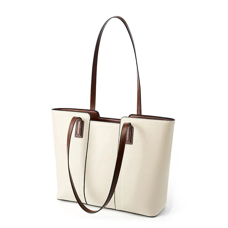 Women's black genuine leather crossbody shoulder bag with multiple internal compartments and a single strap