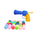 Interactive dog toy launcher gun with soft plush yarn balls for fetch games.