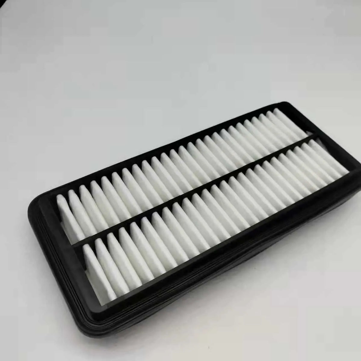 Black car air filter panel measuring 256mm x 113mm x 40mm for Modern vehicle replacement