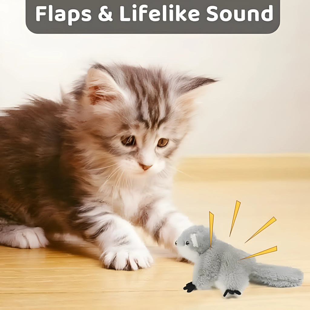 Grey flapping squirrel cat toy with USB charging cable on floor