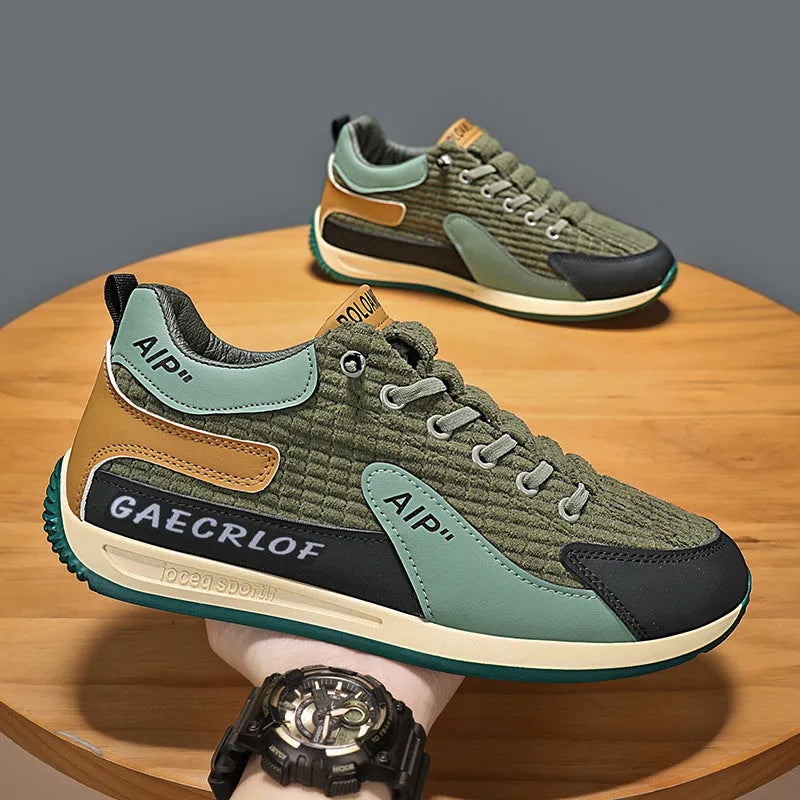 Men's grey and green mesh running shoes with round toe and lace-up closure shown in sizes 39-44